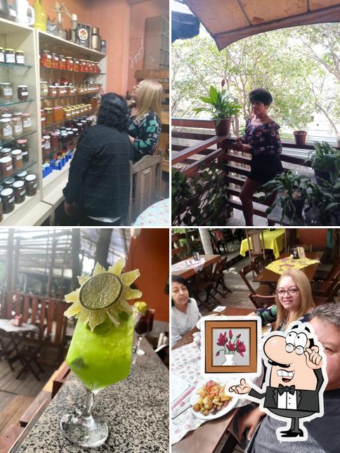 Sente em uma das mesas no Recanto Maria Margarida - Restaurante e Espaço para Eventos