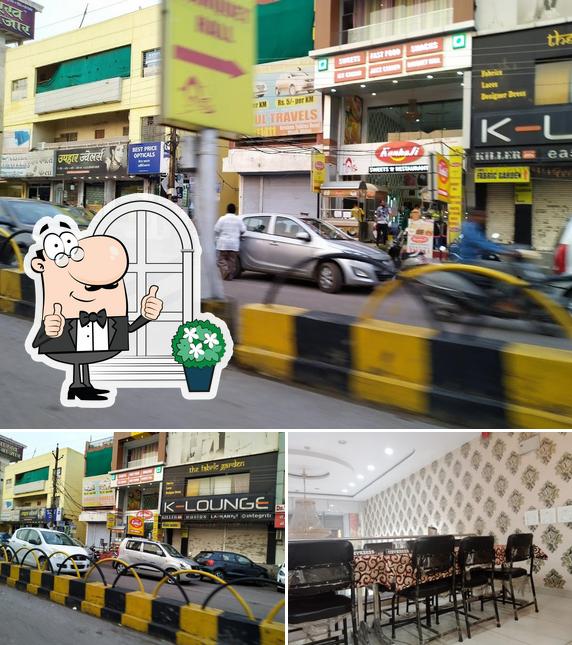 Among different things one can find exterior and dining table at Kanhaji Sweets and Restaurant