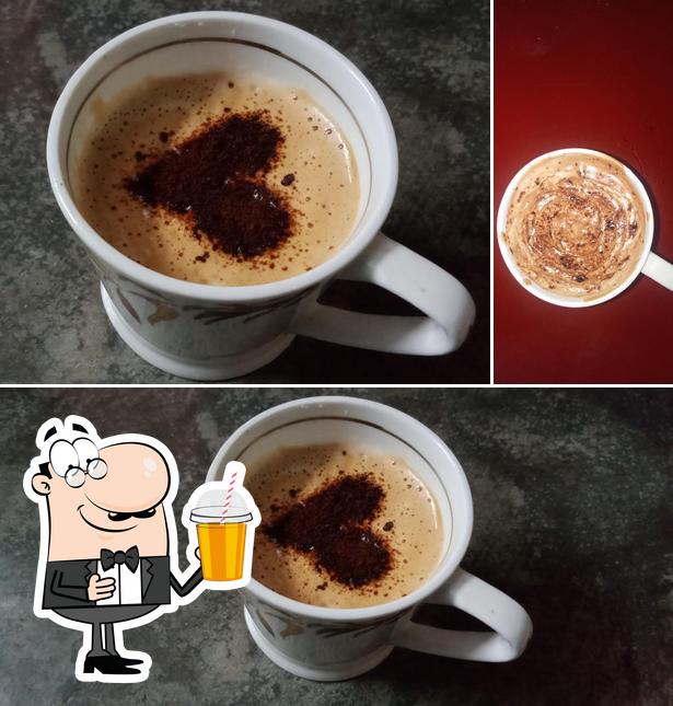 Enjoy a drink at CROSSROAD CAFE. FASTFOOD CUM RESTAURANT