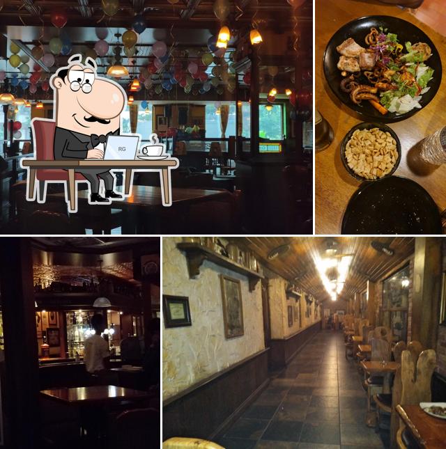 Take a seat at one of the tables at The Moon And Sixpence