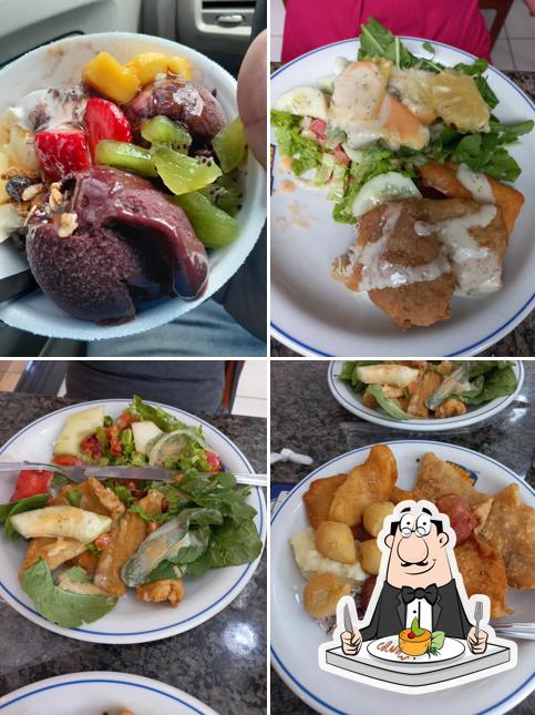 Comida em Restaurante Mão na Massa