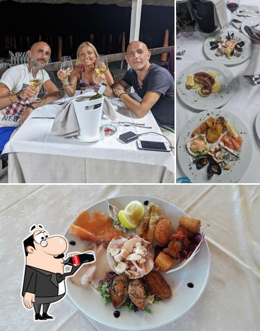 Questa è la foto che presenta la bevanda e cibo di Lido Nettuno
