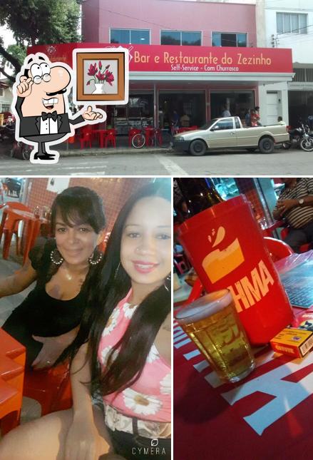 Sente em uma das mesas no Bar e Restaurante do Zezinho
