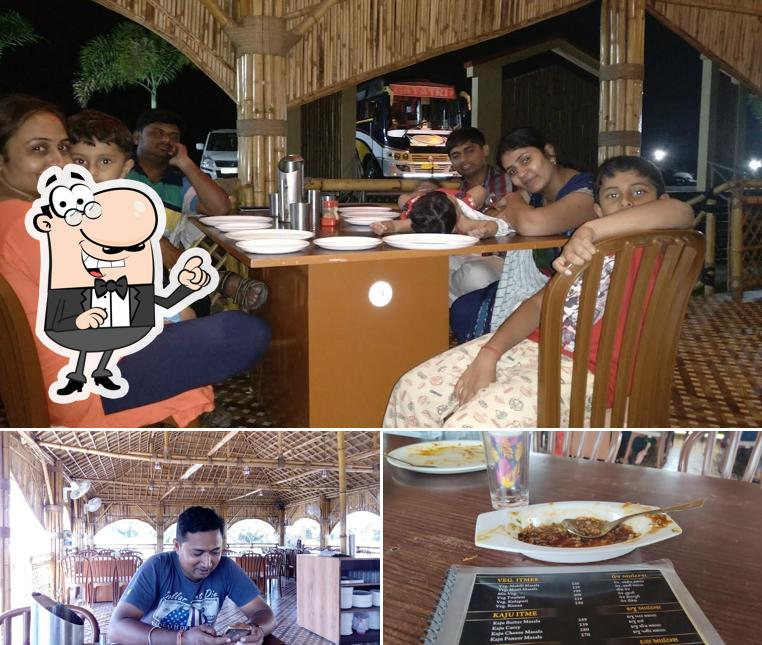 Take a seat at one of the tables at Hotel imperial wood