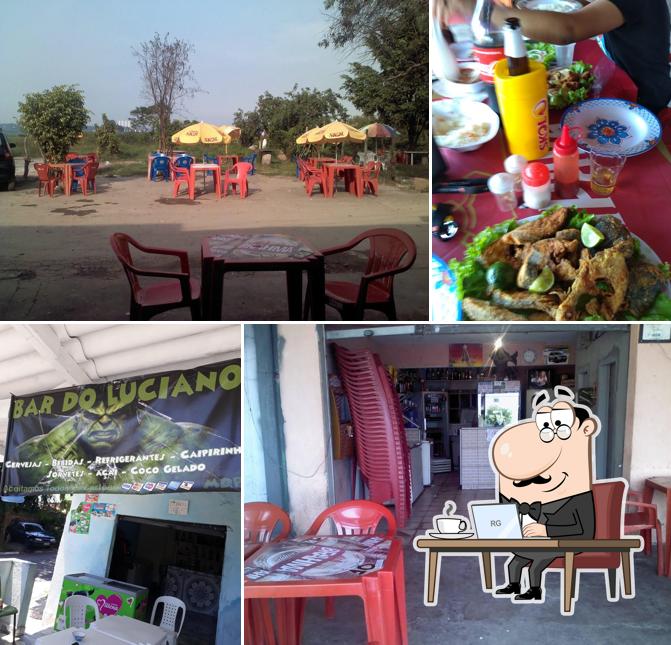 Sente em uma das mesas no Bar do peixe do luciano