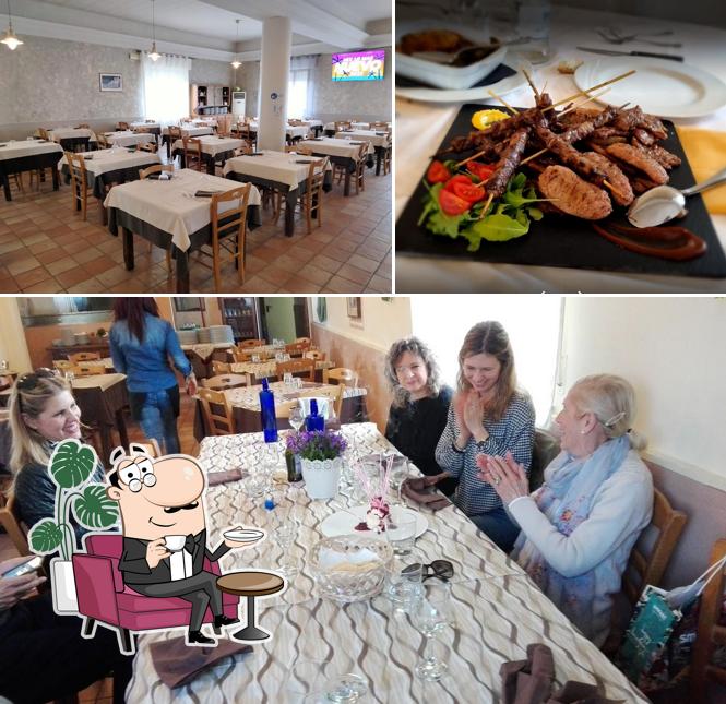 La immagine della interni e la carne di RISTORANTE BRACERIA PIZZERIA COLLE PARADISO