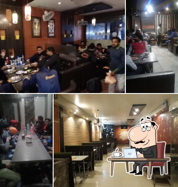 Take a seat at one of the tables at Amrit Dhaba