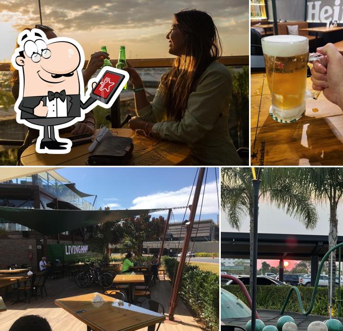 Dê uma olhada a imagem mostrando exterior e bebida a Living HNK Brasília