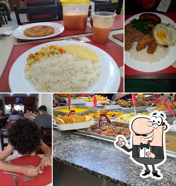 Sente em uma das mesas no Lígia Refeições Vila Matilde