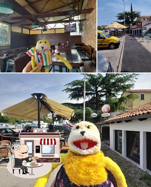 Cafe bar Submarine si caratterizza per la esterno e cibo