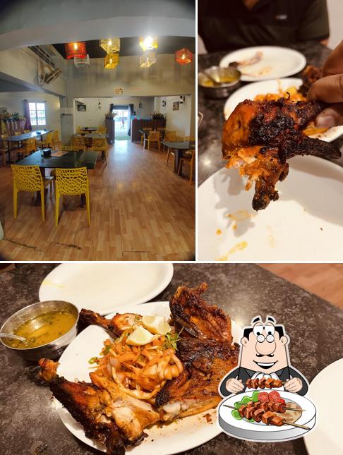 This is the image showing food and interior at Hotel AAISAHEB AND BIRYANI HOUSE