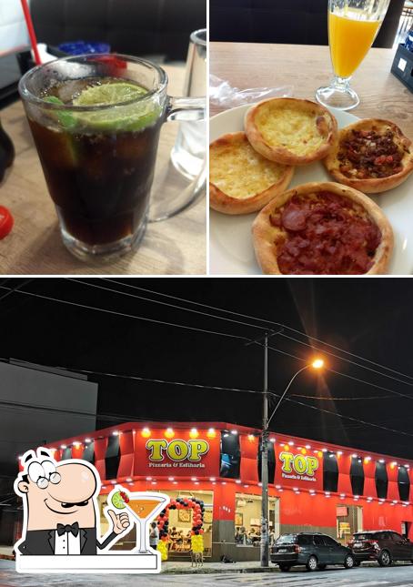 A foto da bebida e exterior no TOP PIZZARIA E ESFIHARIA COSMOPOLIS