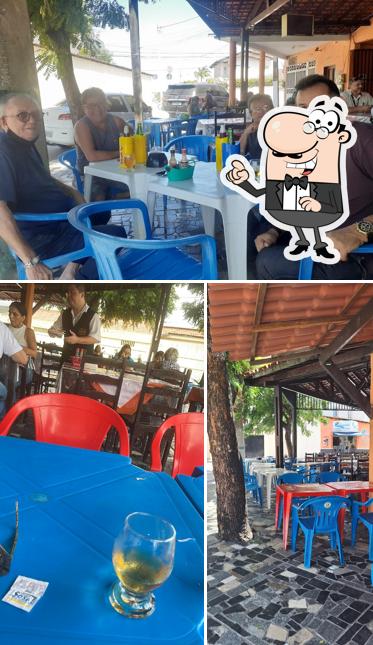 Sente em uma das mesas no Churrascaria Katoinh