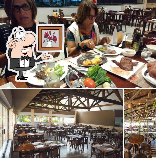 Sente em uma das mesas no Meu Cantinho Churrascaria - SC401