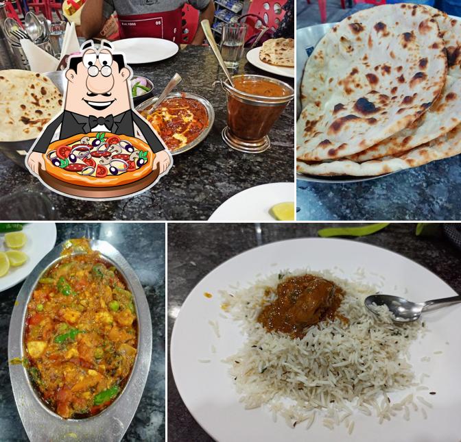 Get pizza at NIRBASI FAMILY RESTAURANT