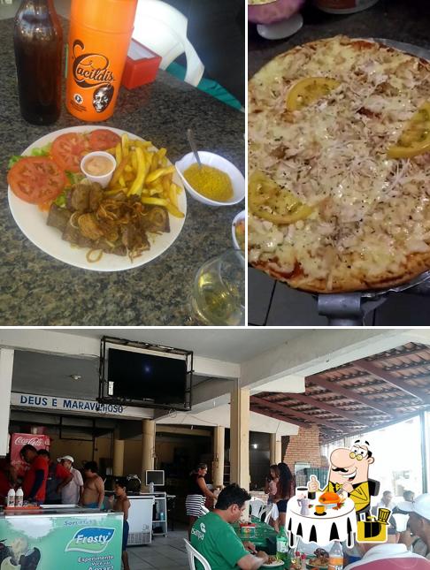 A ilustração a Miraíma Grill - Restaurante e Pizzaria’s comida e interior