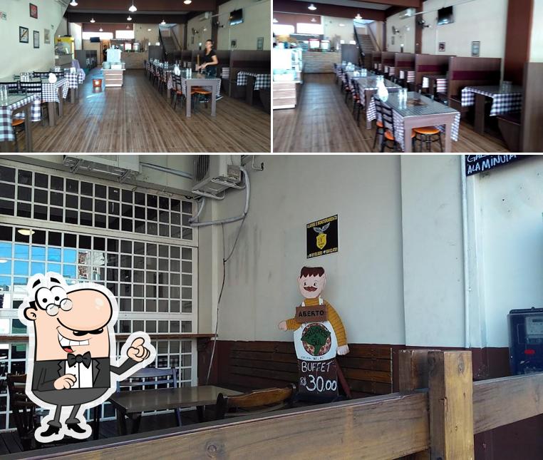 O interior do Restaurante & Pizzaria Sabores do Sul
