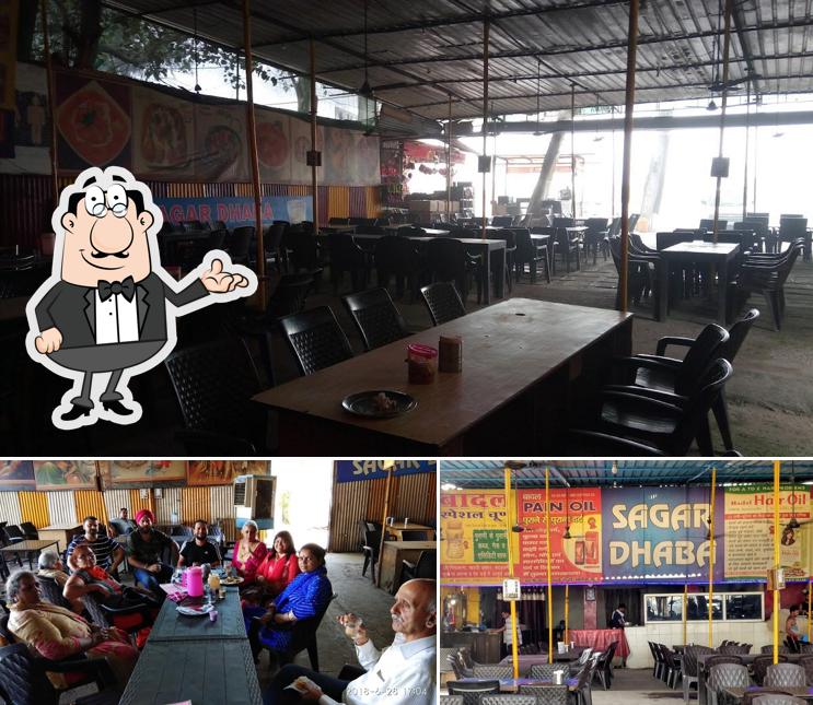 Take a seat at one of the tables at GRS SAGAR DHABHA