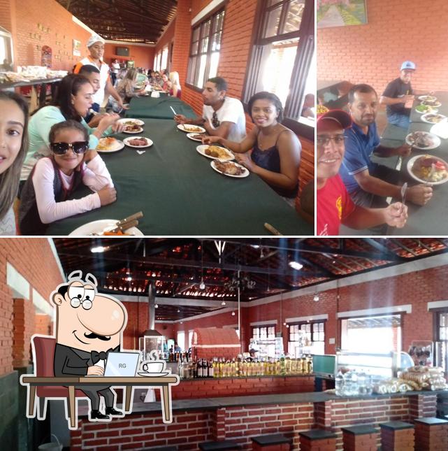 O interior do TREM DE MINAS - CHURRASCARIA E LANCHONETE