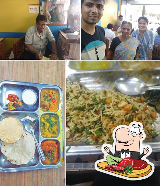 Pick meat dishes at Navrang Restaurant pure veg thali in Panjim