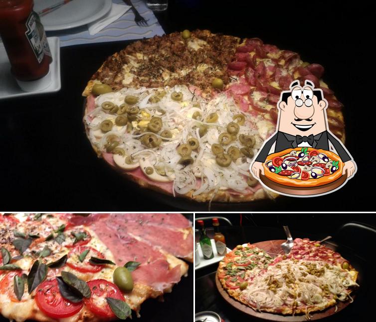 No Pizzaria Disco Voador - A Maior Pizzaria Temática De SC, você pode desfrutar de pizza