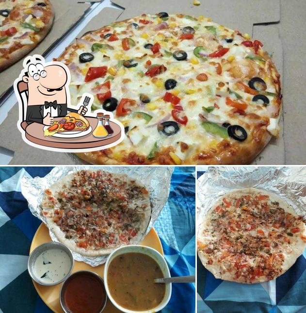 Order pizza at Kamboj's The Spice