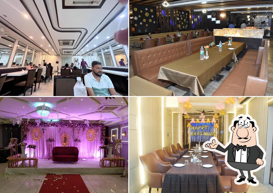 Take a seat at one of the tables at PARKLANE HOTEL AND RESTAURANT