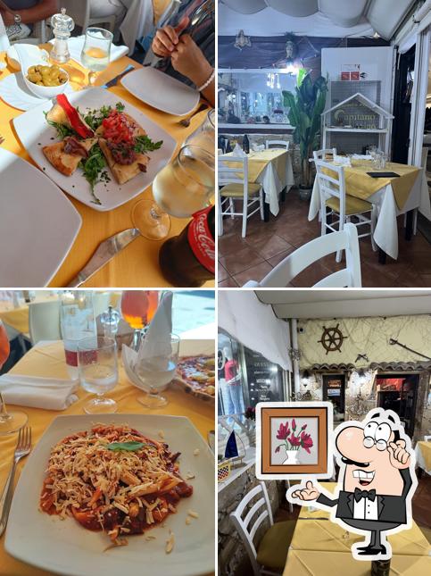 Siediti a un tavolo di Ristorante Pizzeria Capitano Uncino Giardini Naxos