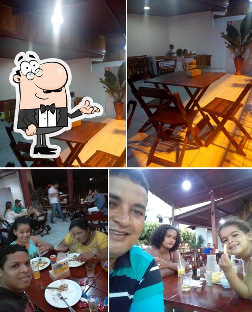 Sente em uma das mesas no CHOPERIA CHOPP BEER