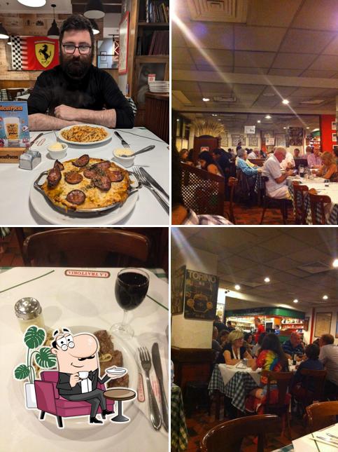 Sente em uma das mesas no La Trattoria