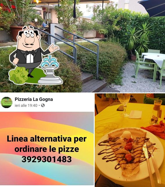 La immagine della esterno e tavolo da pranzo di Pizzeria La Gogna
