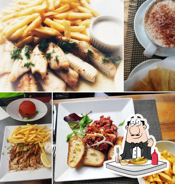 Assaggia le patatine fritte a Café de la Presse