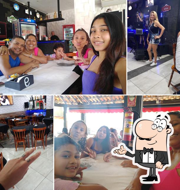 Sente em uma das mesas no Nega Veia - Culinária Contemporânea - Bar e Restaurante Frutos do Mar Petiscos Pratos Executivos