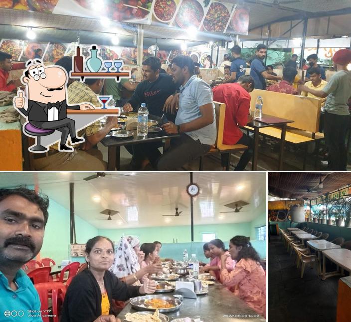 Take a seat at one of the tables at Vakratund dhaba