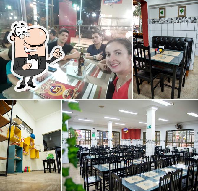 O interior do DK Lanches e Pizzas