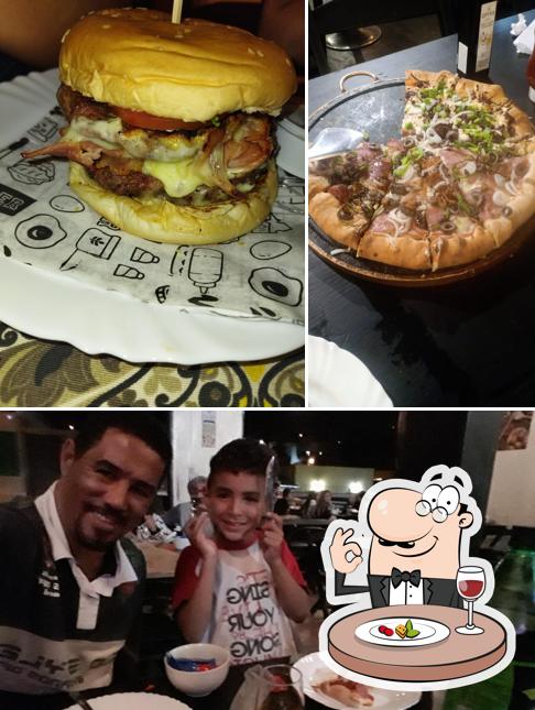 A ilustração da comida e mesa de jantar no Pizzaria Pizza Planet gourmet