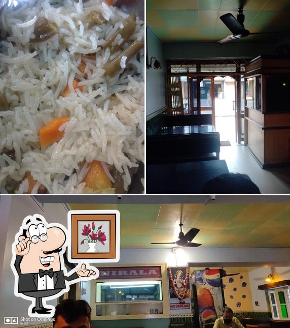 This is the photo showing interior and food at Nirala Restaurant ( AC Restaurant )