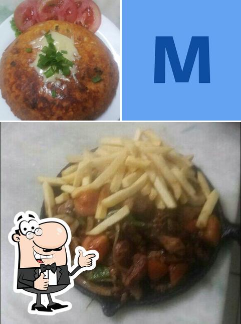 Look at the photo of Mandikas bar