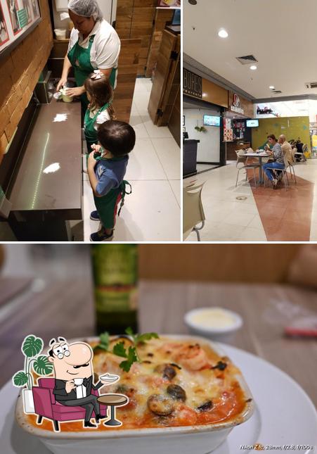 Entre diferentes coisas, interior e comida podem ser encontrados no Cantina Art Pizza e Massas