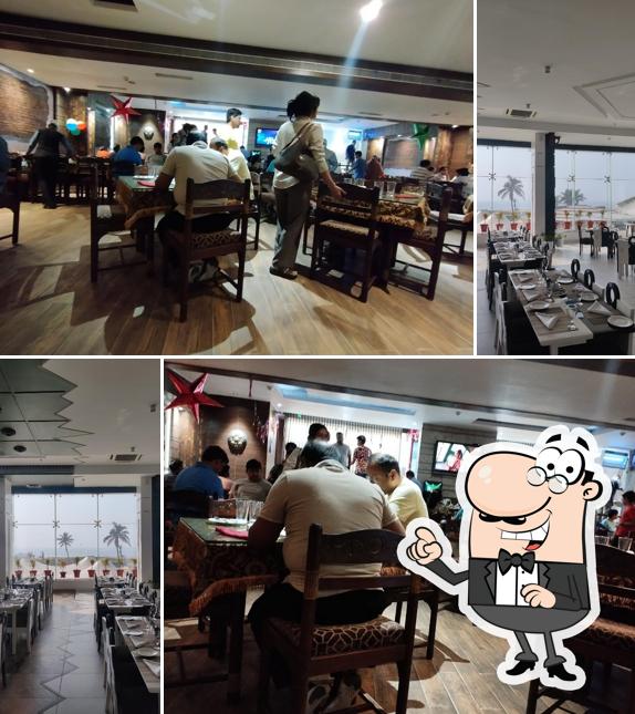 Take a seat at one of the tables at Gajapati