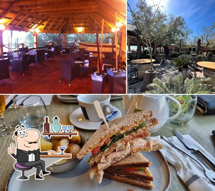 Restaurant Les Sables Rouges Plage de l'Arinella Bastia se distingue par sa intérieur et nourriture