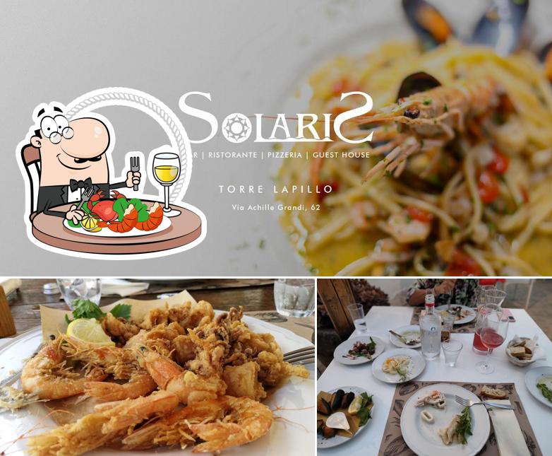 Solaris Torre Lapillo Ristorante - Pizzeria - Bar - Guest House serve un'ampia selezione di pasti di mare