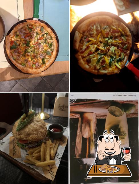 Pick pizza at Laidback Cafe - M3M International Financial Center