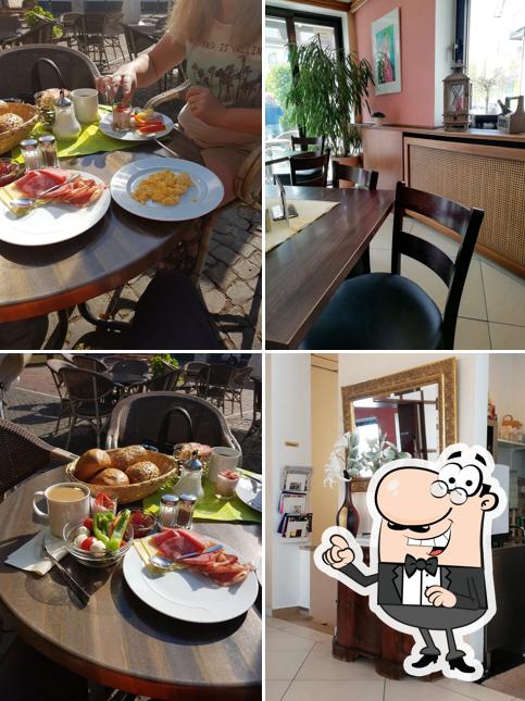 Installez-vous à l'une des tables de Cafe Süße Ecke