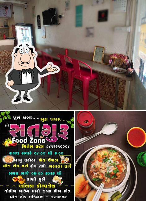 This is the picture depicting interior and food at Sadguru Foodzone