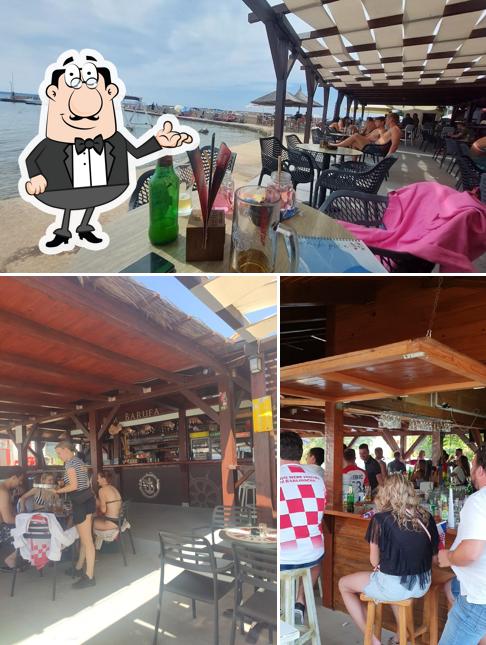 Siediti a un tavolo di Beach Bar Barufa