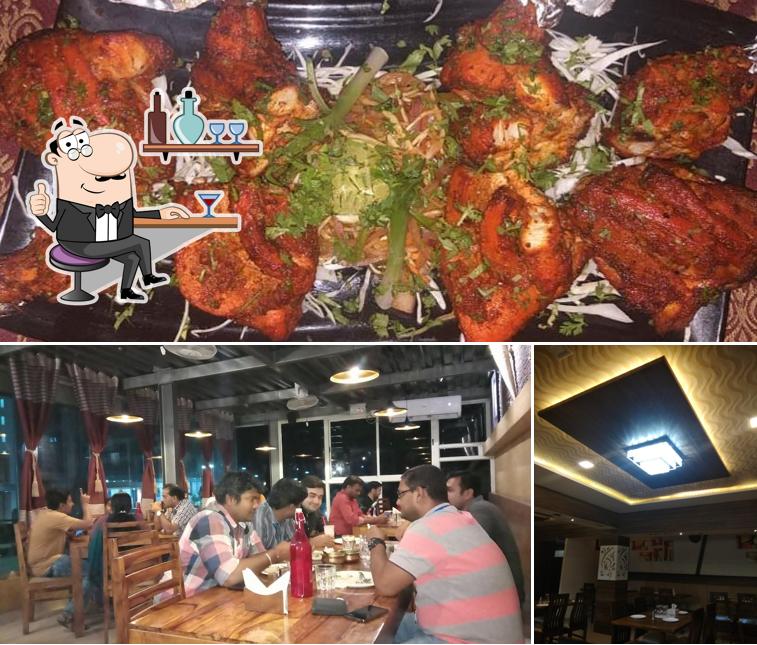 Among various things one can find interior and food at Samruddhi Restaurant and Bar