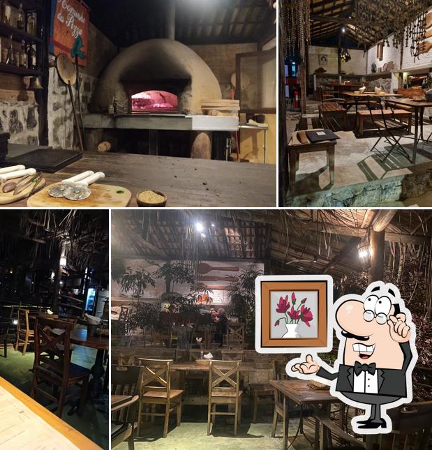 Sente em uma das mesas no O Caminho da Pizza