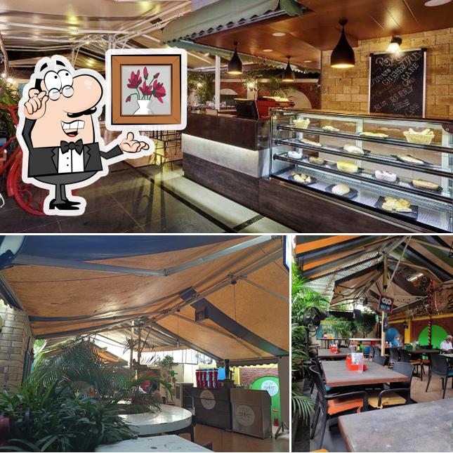 Take a seat at one of the tables at Hakuna Matata J.M Road