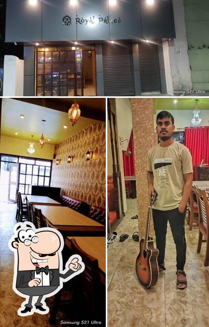 Take a seat at one of the tables at Royal palace Resturant